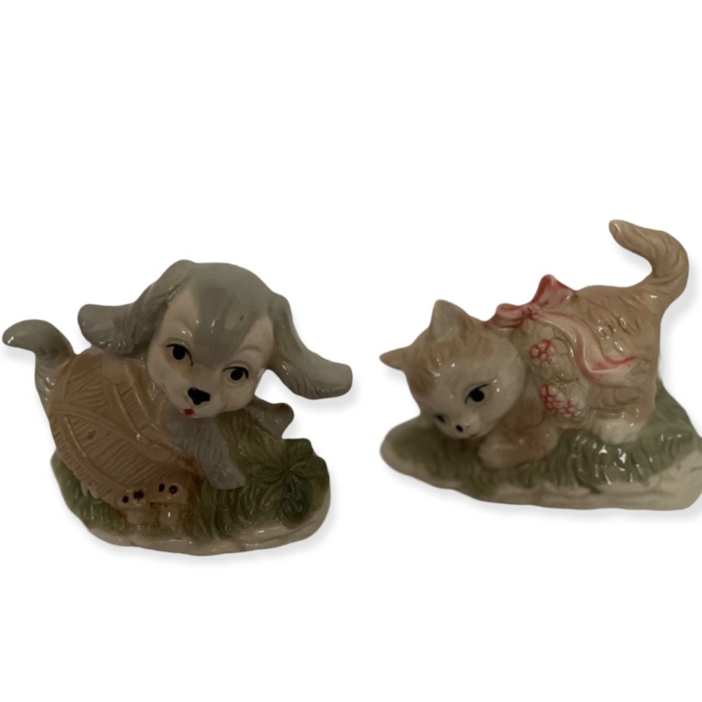 Vintage set of retro ceramic cat and dog figurines.